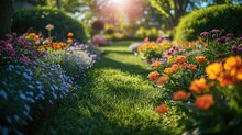 Beautiful Well-kept Spring Garden. The Green Lawn Emphasizes The Full Bloom Of Flowers In The Mixborder. Diverse Floral Spectrum Of Tulips, Daffodils, Hyacinths.