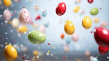 Cute colorful easter eggs falling down. Festive blurred background