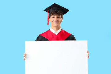 Poster - Male graduate student with blank poster on blue background