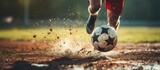 Fototapeta Fototapety sport - Photo shot of legs Soccer player running dribbling after the ball in stadium soccer