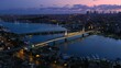 Metro Bridge and Station over the Golden Horn just before sunrise on a summer morning. Atatürk or Unkapanı Bridge seen from behind. Aerial view

