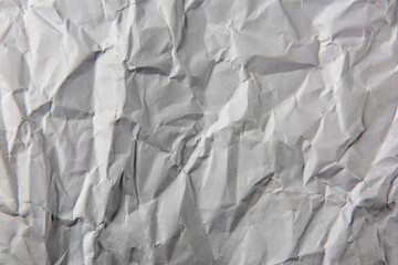 Wall Mural - crumpled gray paper texture background.