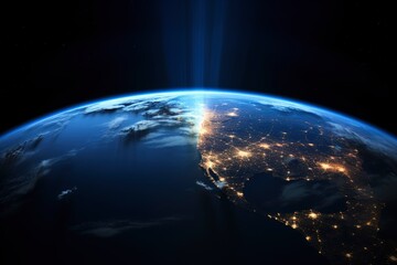 an image of earth seen from space, clearly showing the division between the illuminated part and the