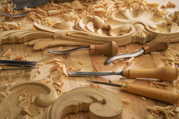 Wall Mural - Professional tools on a wooden table in the workshop. Surface covered with sawdust. Carpenter working with tools close-up