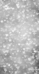 Wall Mural -  Glowing silver white bokeh with hearts vertical illustration background.