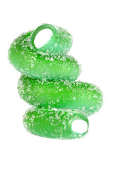 Wall Mural - Levitation of green jelly candy strip in sugar sprinkles isolated on transparent background.