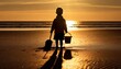 Małe dziecko trzymające wiaderko i małą łopatkę do piasku stoi na plaży oświetlone światłem zachodzącego słońca