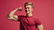 Young strong sporty toned sportsman man isolated on plain red background. Workout sport fit body concept