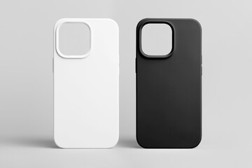 black and white phone case mock up for iPhone 15 Pro isolated on grey background, set of two covers for smart phone