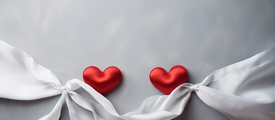 Poster - Red hearts for Valentine's day on a background white silk close up. Generative AI.