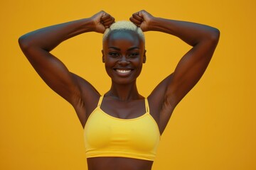 Poster - A woman in a yellow sports bra top posing for a picture. Versatile image suitable for fitness, lifestyle, or health-related content