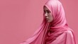 Portrait of an young Muslim woman in burka against a pink clean backdrop, Generative AI.