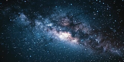 Poster - A stunning image of a large galaxy filled with countless stars. Perfect for illustrating the vastness and beauty of the universe. Ideal for science and astronomy-related projects