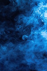 Poster - Close-up shot of blue smoke on a black background. Perfect for adding a mysterious and ethereal touch to your design projects