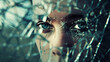 A powerful image of mental pain visualized through a distorted self-portrait in a shattered mirror reflecting inner turmoil.