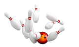 ball hitting bowling pins isolated on white.