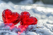 Two red hearts on a background of white snow close-up. Valentine's day concept. Valentine's Day.