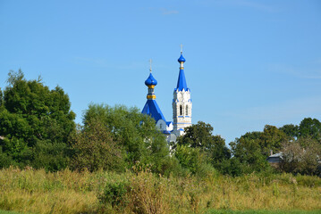 Canvas Print - Rural landscape with Church of St. Dmitry Solunsky in the village Korobovka