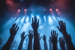 © Andrii - hands of fans crowd at concert. Generative ai