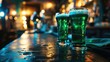 A group of glasses with green beer with a pub background on St. Patrick's Day