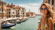 © tanya78 - Girl in sunglasses and a sundress against the backdrop of Venice visiting