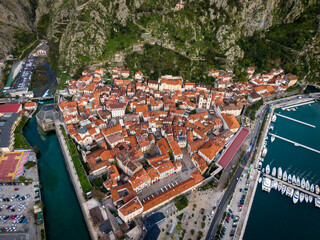 The aerial view of ancient city of Kotor on dusk light 