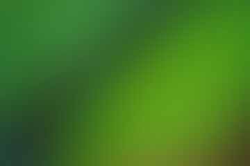 Abstract blurred background image of green colors gradient used as an illustration. Designing posters or advertisements.