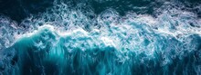 Beautiful Photo Of Blue Water Flowing In Waves With White Foam In A Ocean. Taken From Up Top Above Perspective. Very Wide Banner Wallpaper Background 8:3