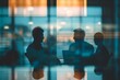© Kuo - A group of young businessmen working and communicating together in an office, photo taking from their back view with selective focus, in minimalism and cinematography style...