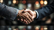 Two hands shake partnership deal
