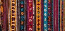  The Image Features A Row Of Colorful, Decorative Cloths. These Cloths Are Lined Up On The Wall And Come In Various Colors Like Red.
