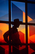 Abstract, geometric shapes creating a cowboy scene in the twilight.
