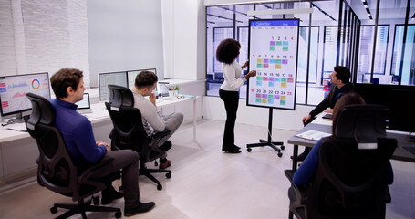 Poster - Diverse Team Meeting With TV Screen