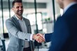 © duyina1990 - Two businessmen shaking hands in an office