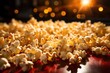 A pile of popcorn with a blurred background of lights