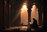 Fototapeta Natura - A Muslim reciting Quran at masjid at evening view