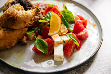 Canvas Print - Cooked gherkin chicken with vegetable salad