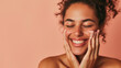 © Angelo - a beautiful woman washing her face. skincare concept.