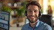happy Male contract service representative telemarketing operator smiling to camera. Happy man call center agent or salesman wearing headset working in customer support office.