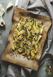 Roasted fennel with nuts on backing sheet, top view. Healthy vegan food