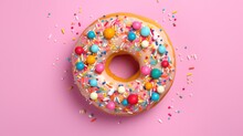 Colorful Sweet Pink Donut On Colored Background. Top View.