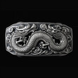 a dragon silver buckle on a black background