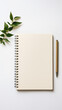 Blank clean white paper and green leaves, planner or copybook with a pen, phone wallpaper, aesthetic background for Instagram stories