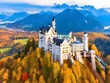 Beautiful aerial view of Neuschwanstein castle in autumn season. Palace situated in Bavaria, Germany. Neuschwanstein castle one of the most popular palace