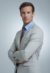 Aufkleber - Portrait, serious and business man with arms crossed for pride in corporate career. Face, confident professional lawyer and attorney working in a suit isolated on gray studio background in Australia