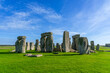 Amazing landscape view of Stonehenge and the blue sky background on a sunny day. The landmark of England and a popular destination among tourist. UNESCO World Heritage Site