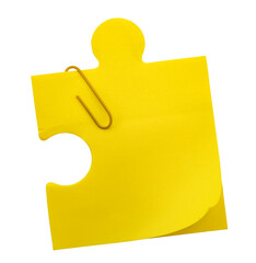 Tear-off sheets of paper for notes in the shape of a puzzle on a white background. Yellow note paper isolate