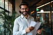 Smiling happy young bearded Latin professional business man executive holding documents and cell phone making mobile call at work on cellphone consulting client standing in modern, Generative AI