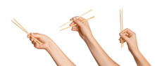 A Set Of Female Hands Holding Wooden Chopsticks For Sushi Or Rolls On A Blank Background.