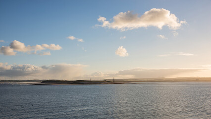 Wall Mural - Stunning dramatic landscape image of Lindisfarne, Holy Island in Northumberland England during Winter